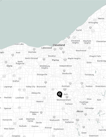 Black and white map showing Cleveland, Akron, and surrounding Ohio cities with a location pin marked near Bath.