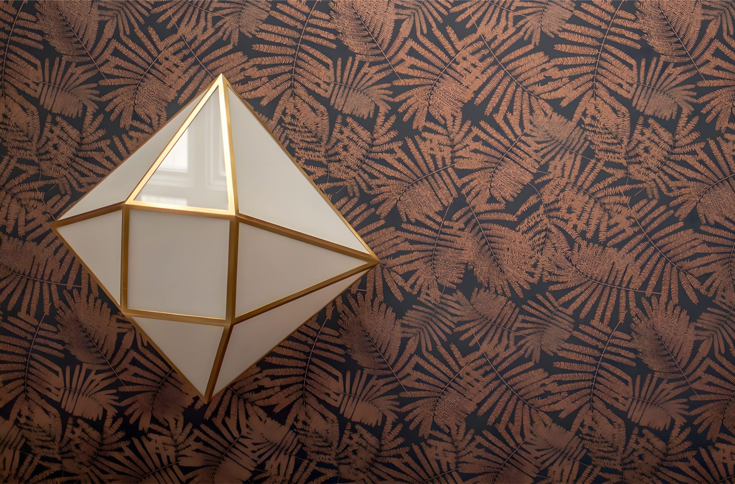 Geometric pendant light with gold frame set against fern-patterned wallpaper in a Cleveland interior design project.