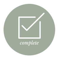 Circle icon with check mark and text “complete” underneath, symbolizing finished tasks, goals, or project completion